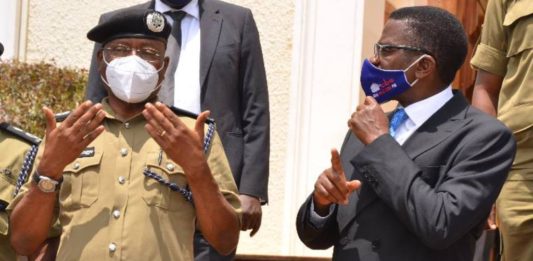 Police political commissar AIGP Asan Kasingye with Buganda Prime Minister Katikkiro Charles Peter Mayiga