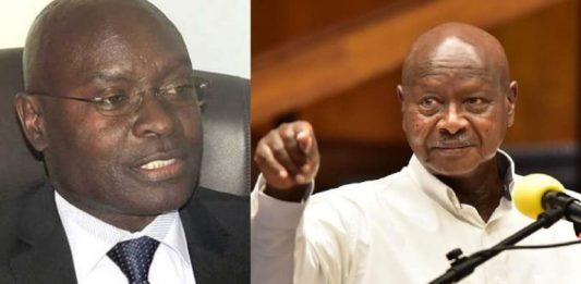 Electoral Commission chairperson Justice Simon Mugenyi Byabakama and Presdient Yoweri Museveni.